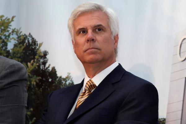 George Norcross III, influential Democratic power broker, listening attentively during the groundbreaking ceremony of the Cooper Cancer Institute in Camden, New Jersey, May 15, 2012.