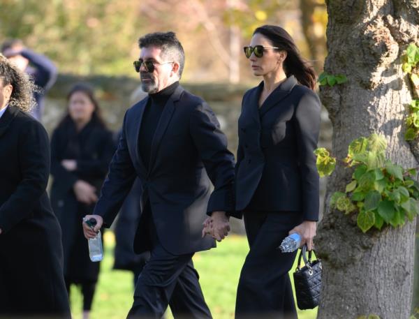 Simon Cowell and Lauren Silverman attend the funeral for singer Liam Payne, former member of One Direction, on November 20, 2024 in Amersham, England.