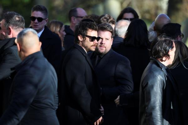 Harry Styles and actor and comedian James Corden depart after the funeral of former One Direction singer Liam Payne at St. Mary's Church in Amersham, near London, Britain, November 20, 2024. 